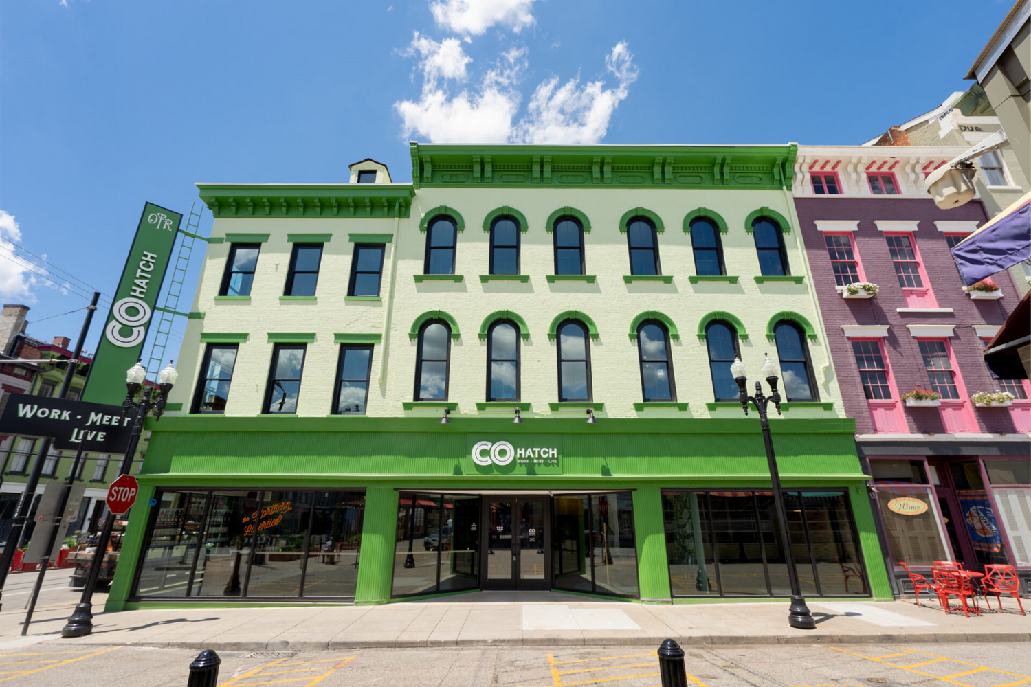 The green COhatch Over The Rhine building is on the corner of the block.